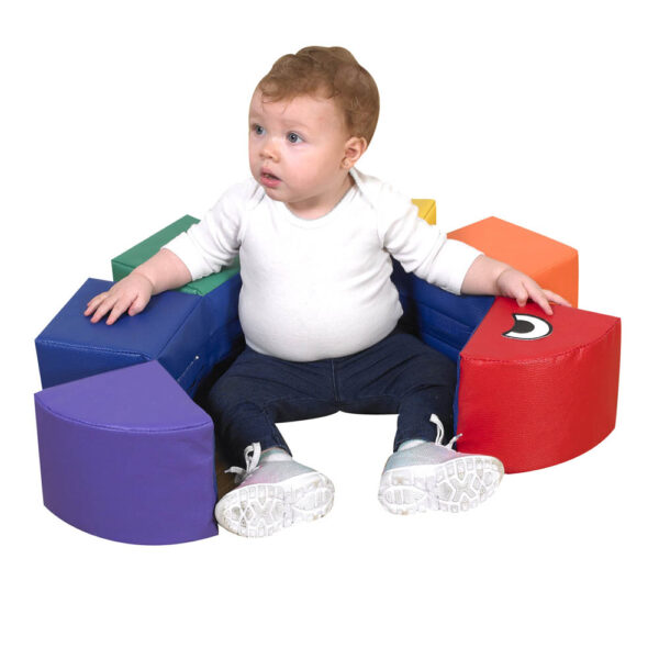 Toddler with Rainbow Inchworm Blocks